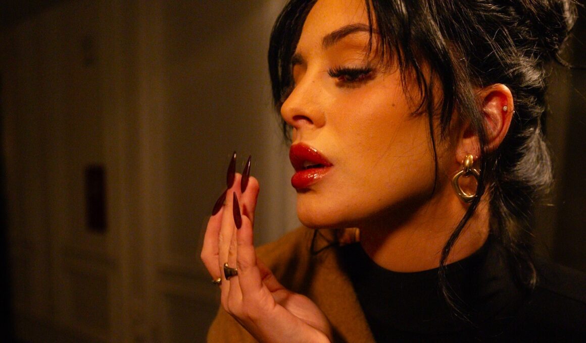 OnlyFans millionaire Camilla Araujo goes viral mocking fitness influencer Ashton Hall by recreating his extreme morning routine in a hilarious 13 million view parody video.