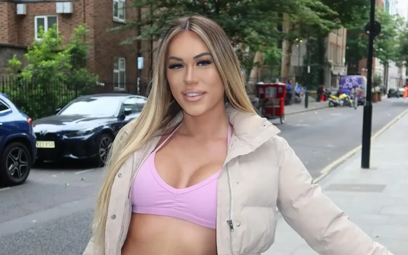 Adult star Kay Manuel posing for a photo.