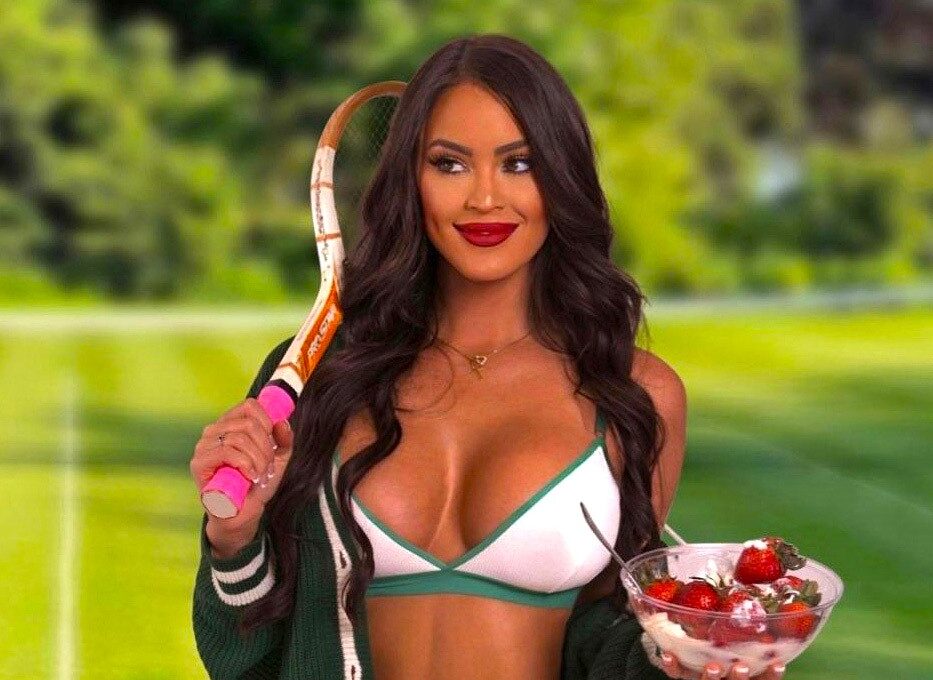 Rachel Stuhlmann poses with strawberries and cream - NudeNewz