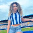 Influencer flashes her bum in a packed football stadium for a $30000 dare, sparking viral reactions as fans praise her bold stunt and her unexpected mid match reveal.