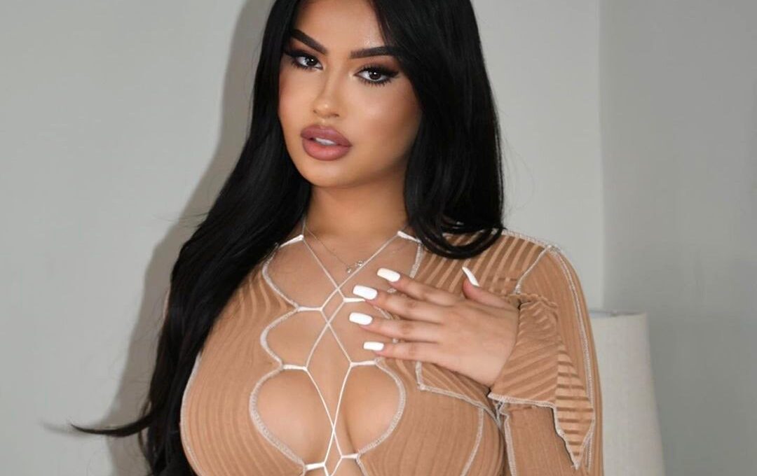 Julia Medeiros posing for a photo - NudeNewz