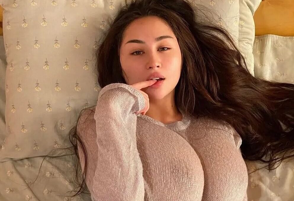 Canadian creator Louisa Khovanski posing for a photo.