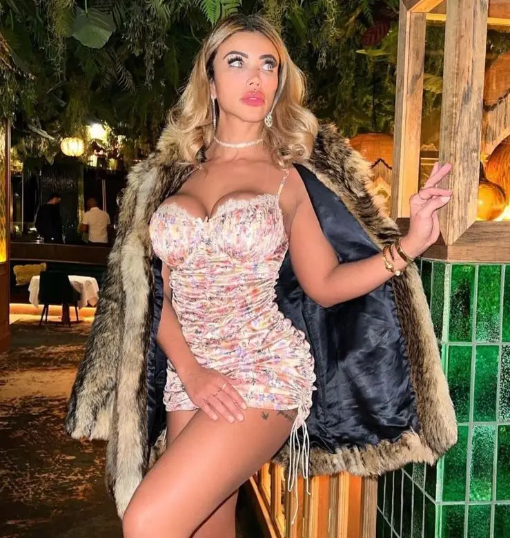 Cris Galera posing for a photo - NudeNewz