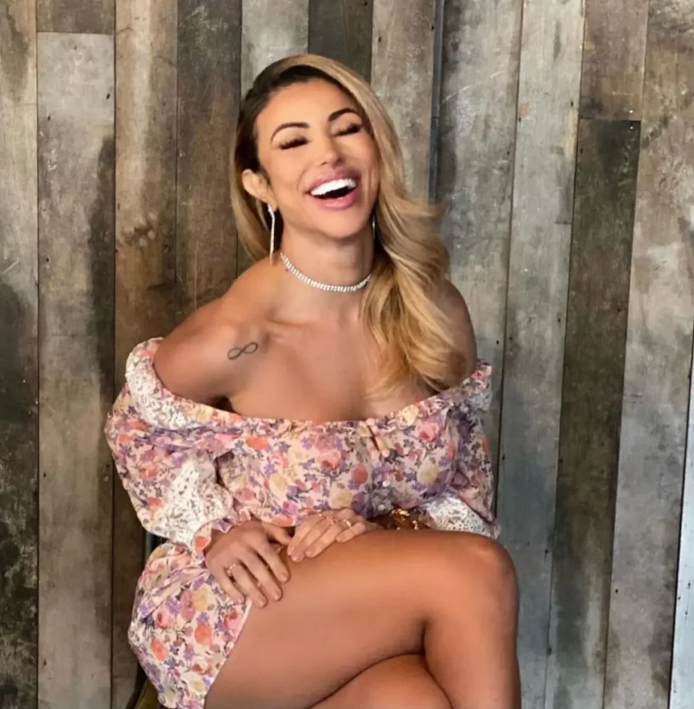 Cris Galera posing for a photo - NudeNewz