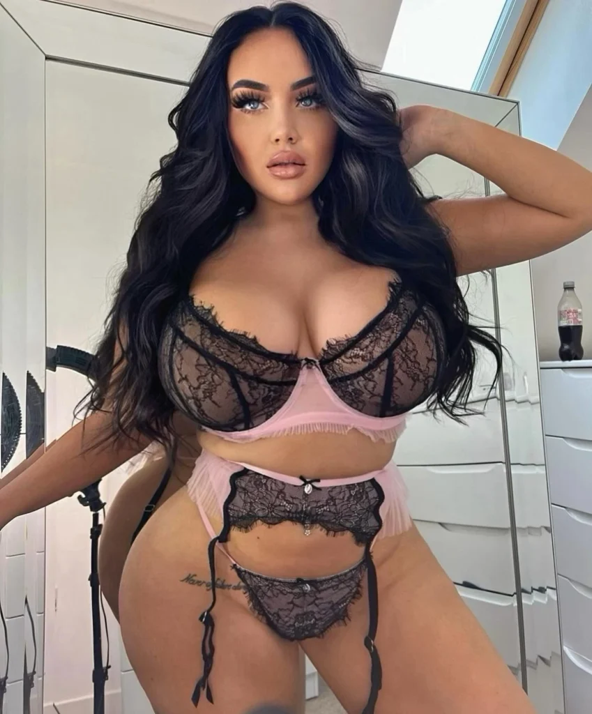 OnlyFans model Amy Sophia posing for a photo - NudeNewz