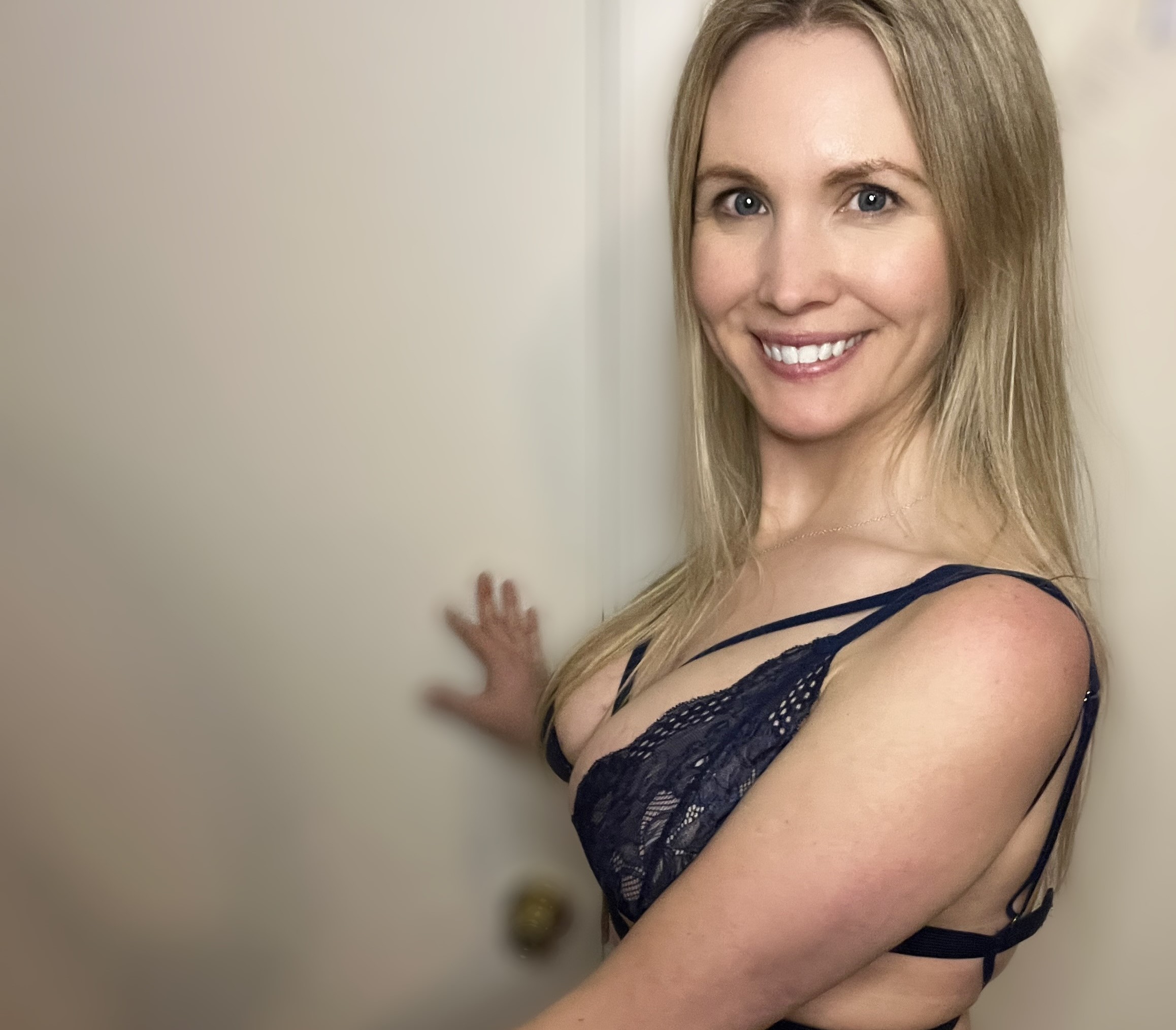 Holly Jane posing for a photo - NudeNewz