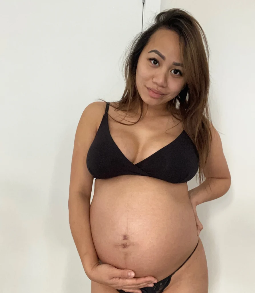 Emily Mai posing while pregnant - NudeNewz