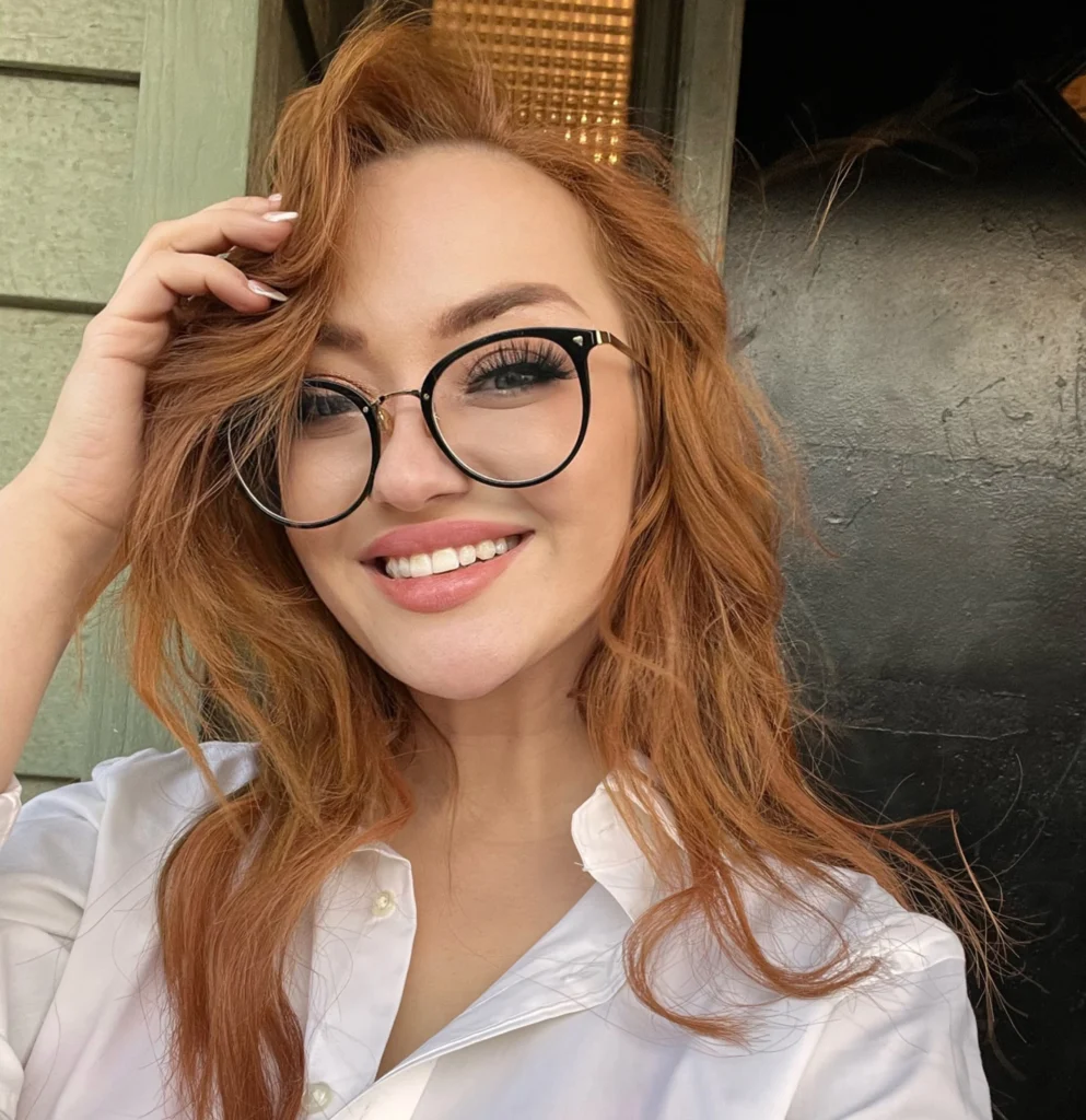 OnlyFans model Emma Magnolia for a photo - NudeNewz