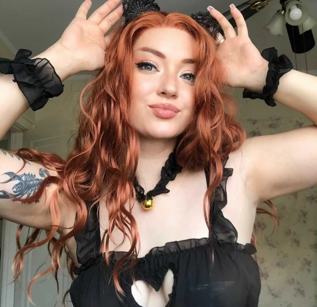 OnlyFans model Emma Magnolia for a photo - NudeNewz