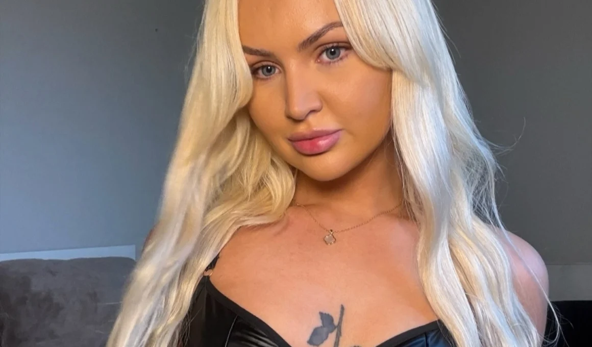 OnlyFans model Katy Shutt posing for a photo - NudeNewz