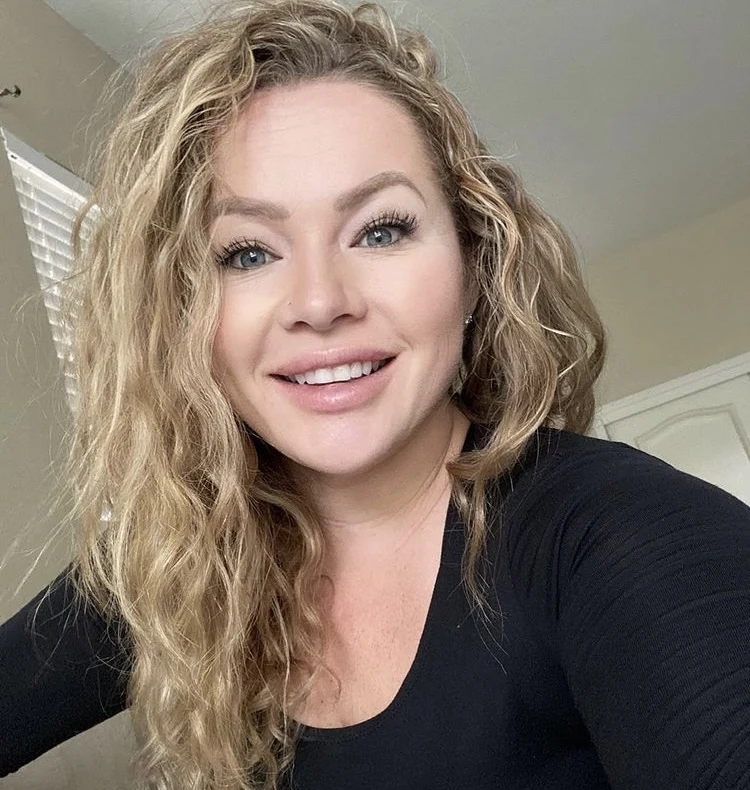 OnlyFans model Nicole Desmond posing for a photo - NudeNewz