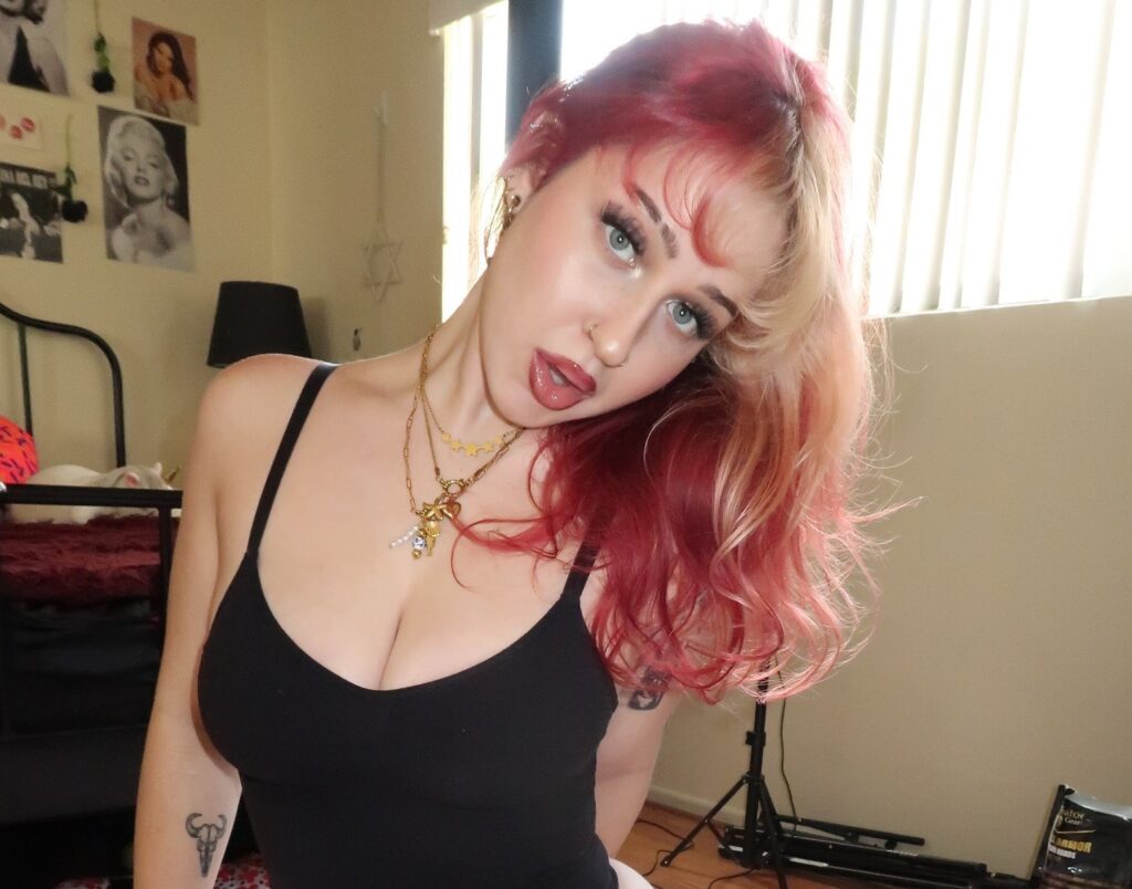 OnlyFans model Rachel Angel posing for a photo - NudeNewz