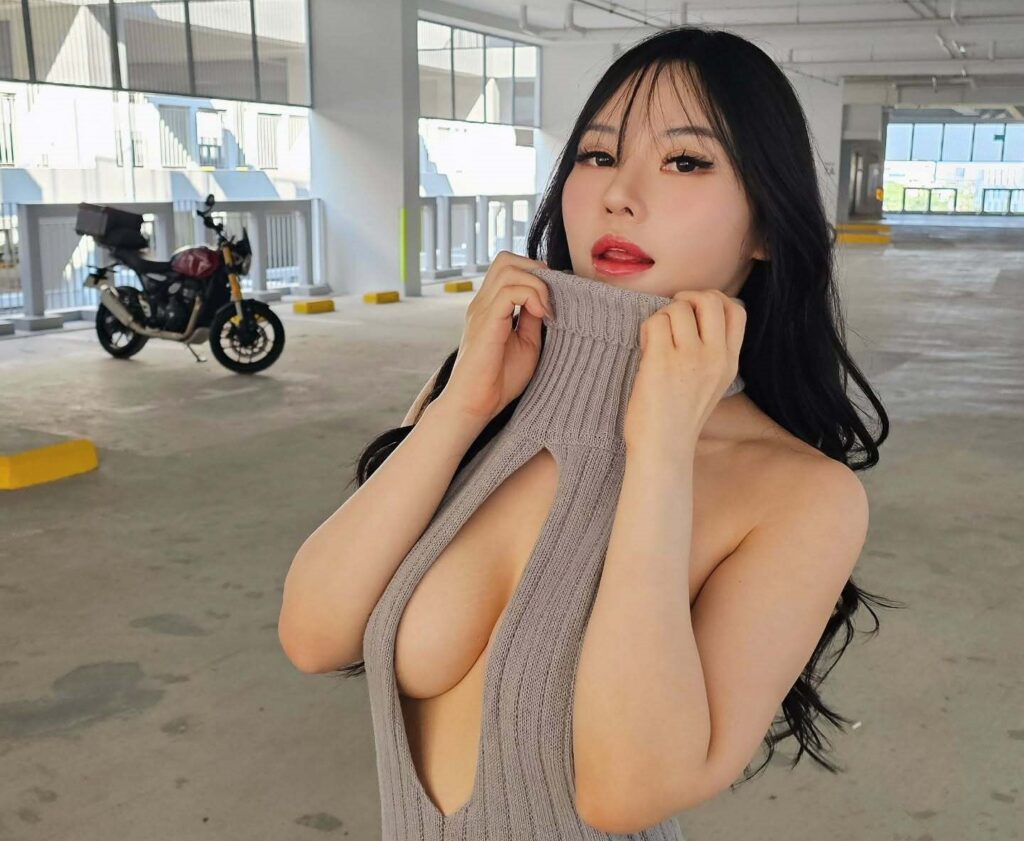OnlyFans model Krystal Wang posing for a photo - NudeNewz