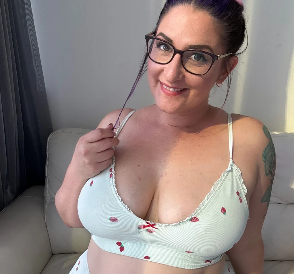 OnlyFans model Poppy Prynne posing for a photo - NudeNewz