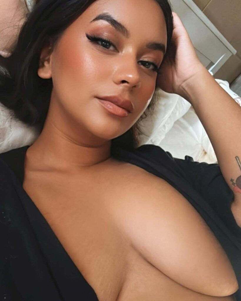 OnlyFans model JennieAfterDark posing for a photo - NudeNewz
