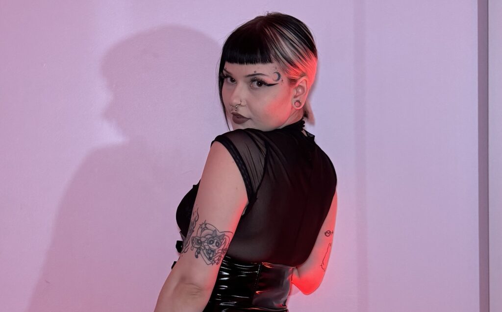 OnlyFans model Serene Sinz posing for a photo - NudeNewz
