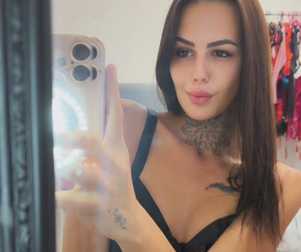 OnlyFans model Kadie Gregory posing for a photo - NudeNewz