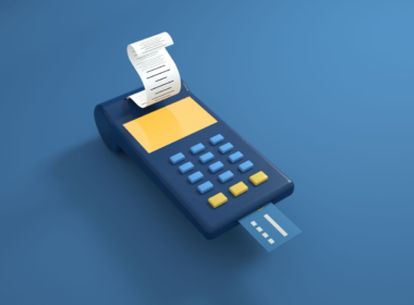 Blue digital card payment terminal on a plain background, representing payment processors for adult creators