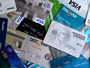 Stack of credit cards fanned out, representing Mastercard's 2026 adult-content processing fee changes