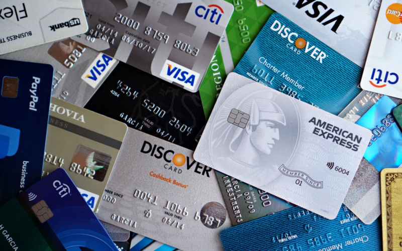 Stack of credit cards fanned out, representing Mastercard's 2026 adult-content processing fee changes