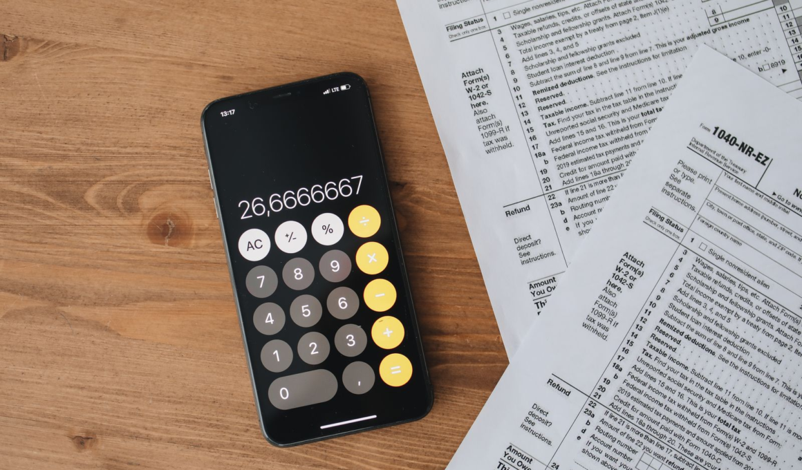 Calculator and tax forms on a wooden desk, representing UK self-assessment tax filing for creators